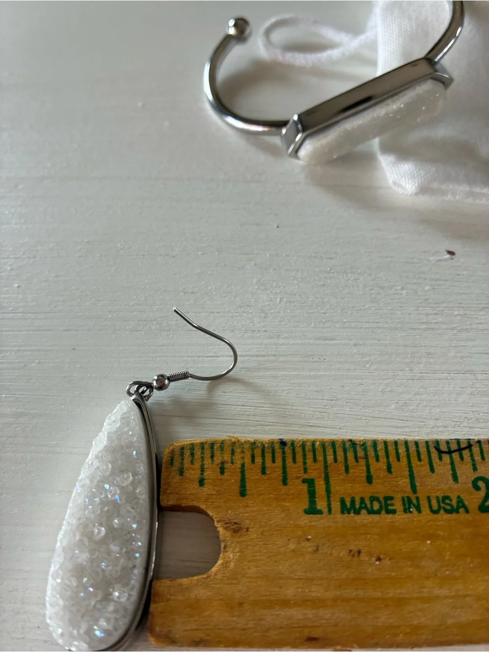 Kinsley Armelle White Druzy Teardrop Earrings and matching silver tone bracelet
